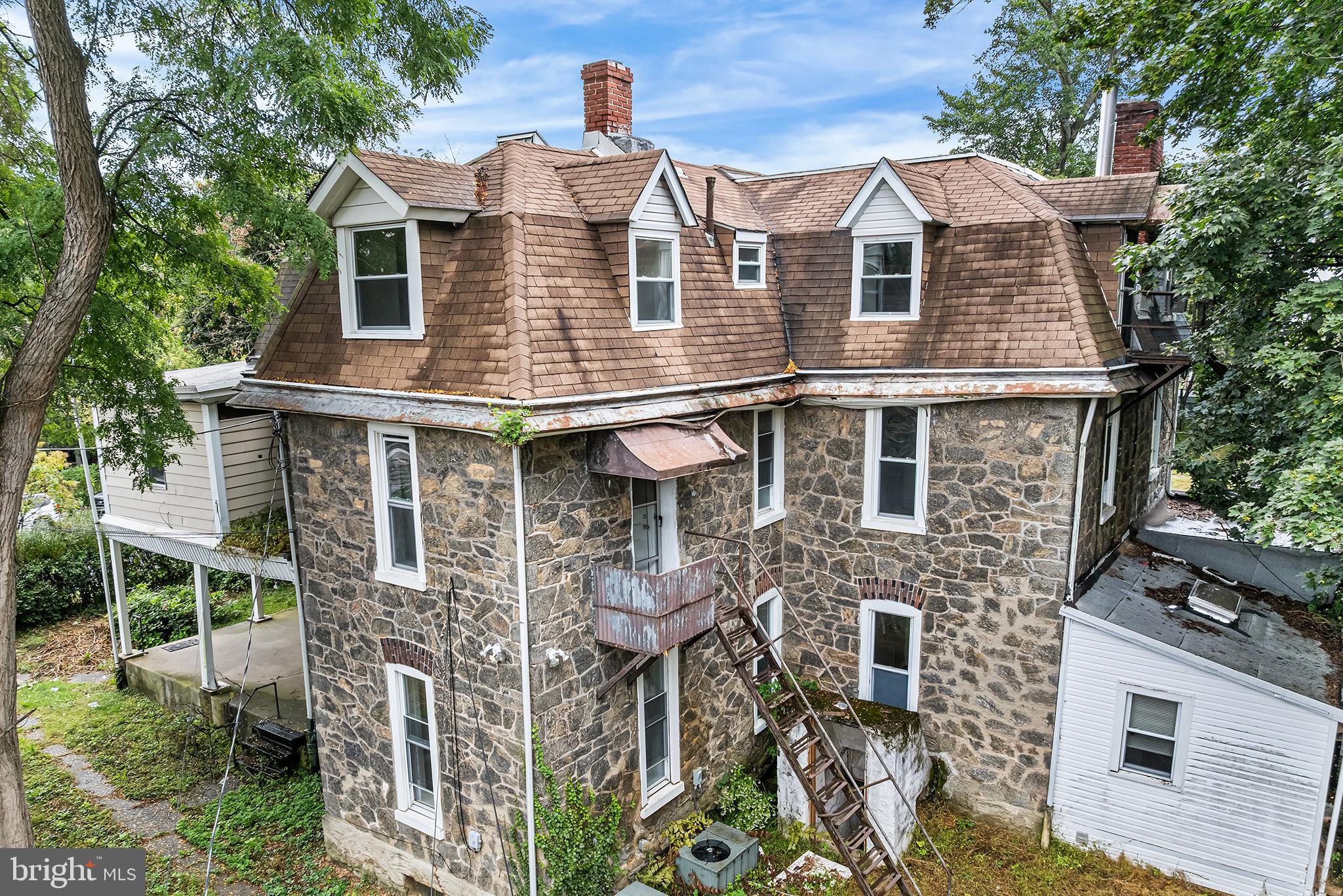 702 Oak Lane Philadelphia, PA 19126 - Photo 9 of 19 a front view of a house with a yard