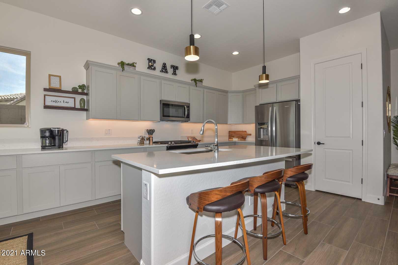 17787 West Sunward Drive Goodyear, AZ 85338 - Photo 14 of 50 Kitchen-Island