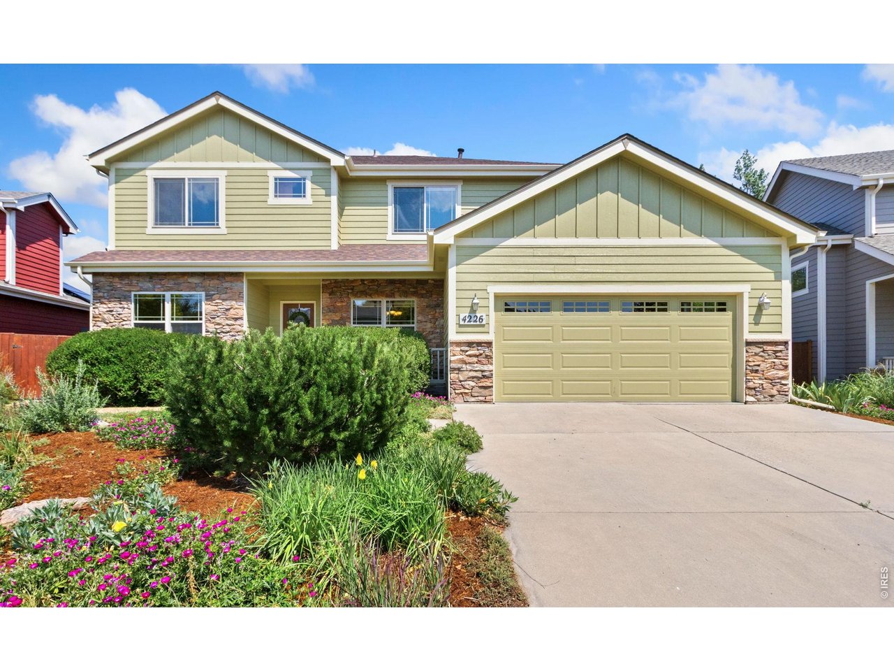 4226 Rolling Gate Road Fort Collins, CO 80526 - Photo 35 of 37 Oversized, finished 3-car tandem garage. Electric vehicle charger included. Furnace and hot water heater, 2021.