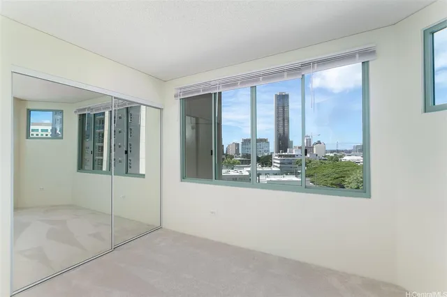 a bathroom with a double vanity sink mirror and shower