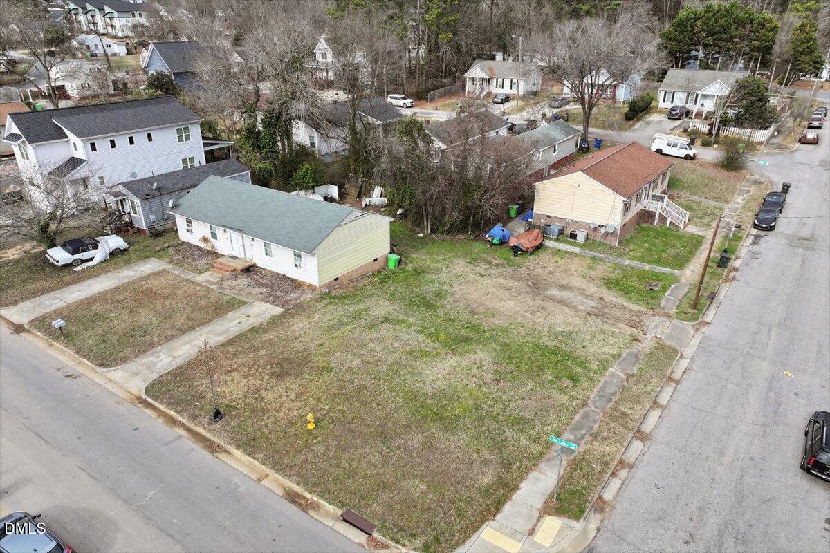1511 Joe Louis Avenue Raleigh, NC 27610 - Photo 3 of 11 a view of a street with houses