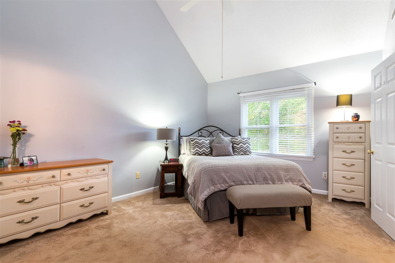 2016 Stonepond Lane Raleigh, NC 27603 - Photo 13 of 23 Vaulted ceilings add to the charm of this large master bedroom. Master Bedroom
