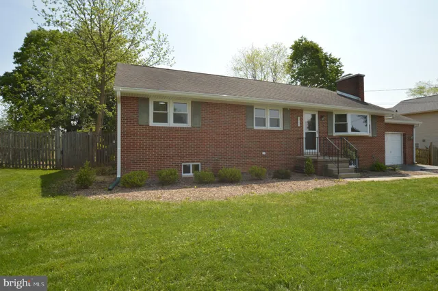 a house view with a garden space