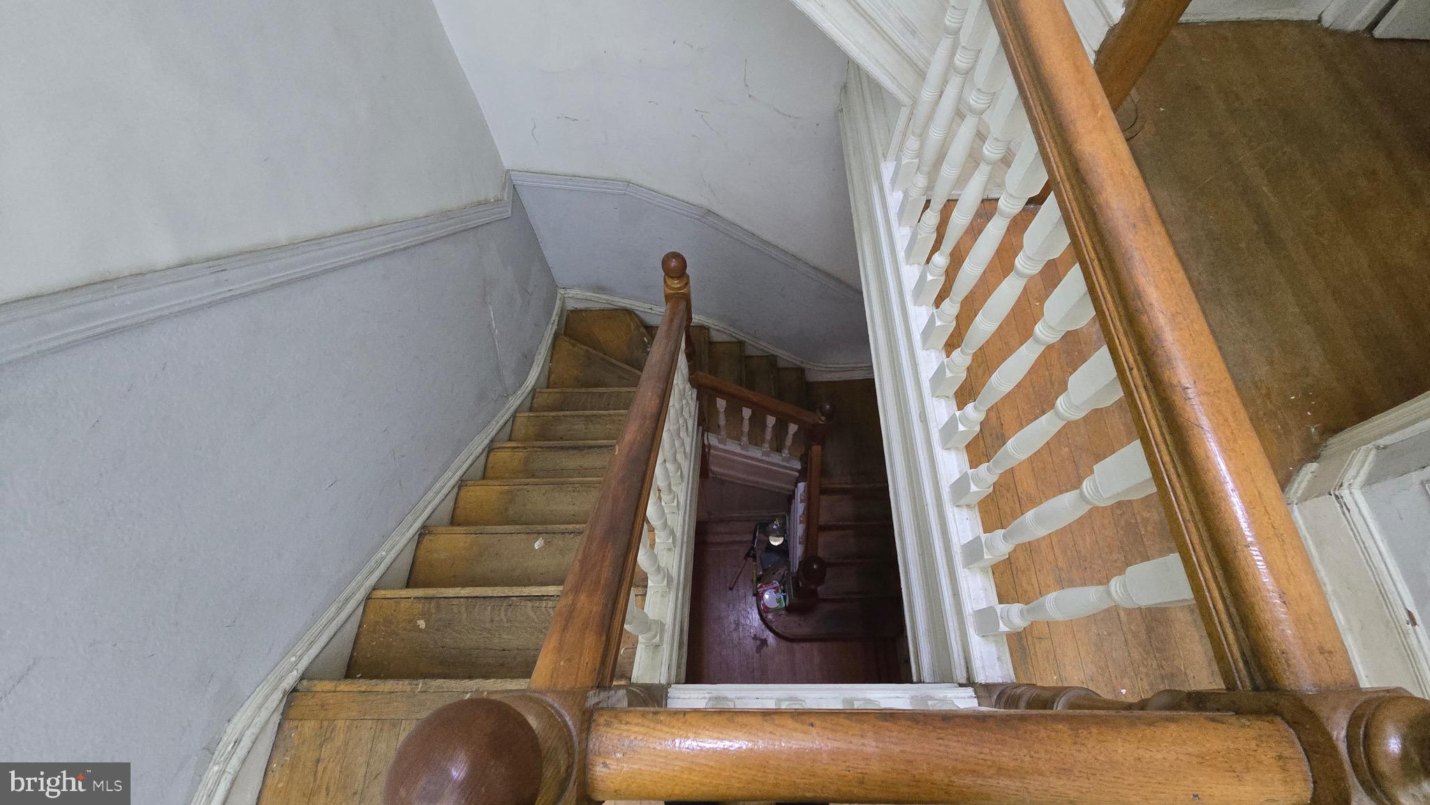 1908 Madison Avenue Baltimore, MD 21217 - Photo 6 of 7 a view of entryway and hall with wooden floor