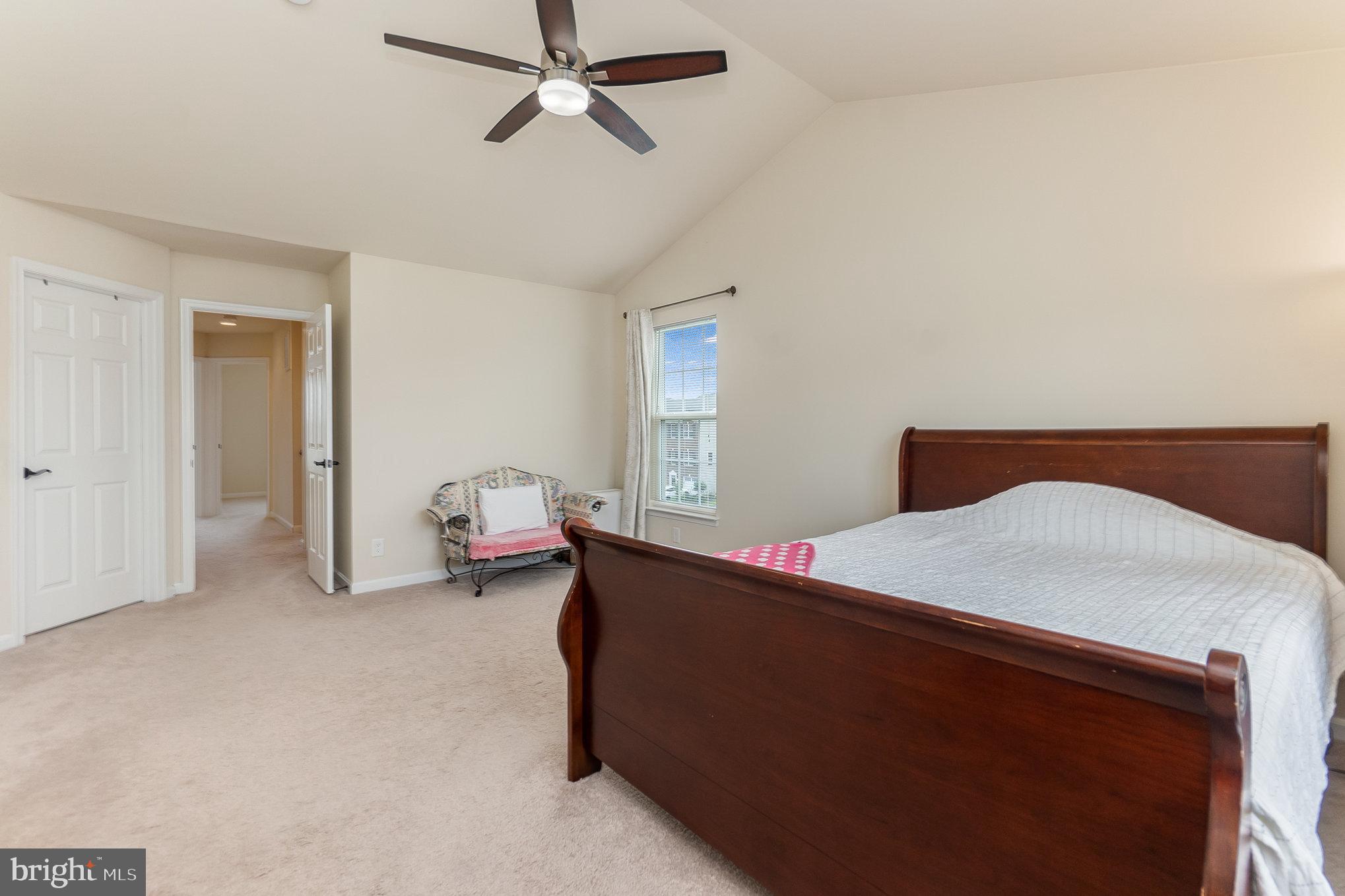 4711 Wensel Road Fredericksburg, VA 22408 - Photo 16 of 33 a bed room with a bed and furniture