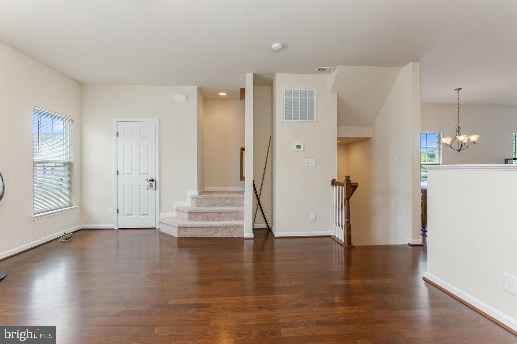 4711 Wensel Road Fredericksburg, VA 22408 - Photo 2 of 33 a view of an empty room and wooden floor