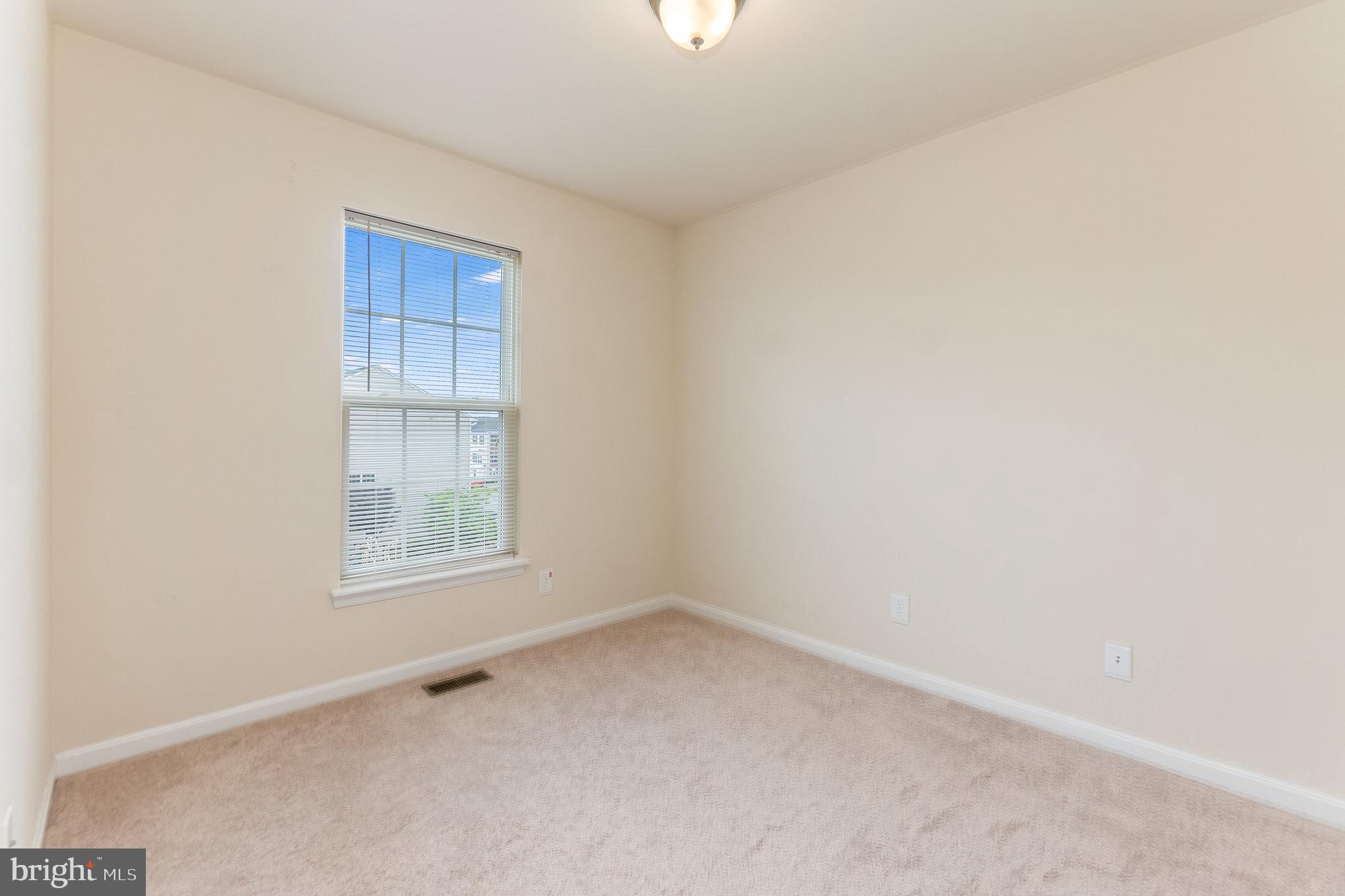 4711 Wensel Road Fredericksburg, VA 22408 - Photo 22 of 33 an empty room with a window