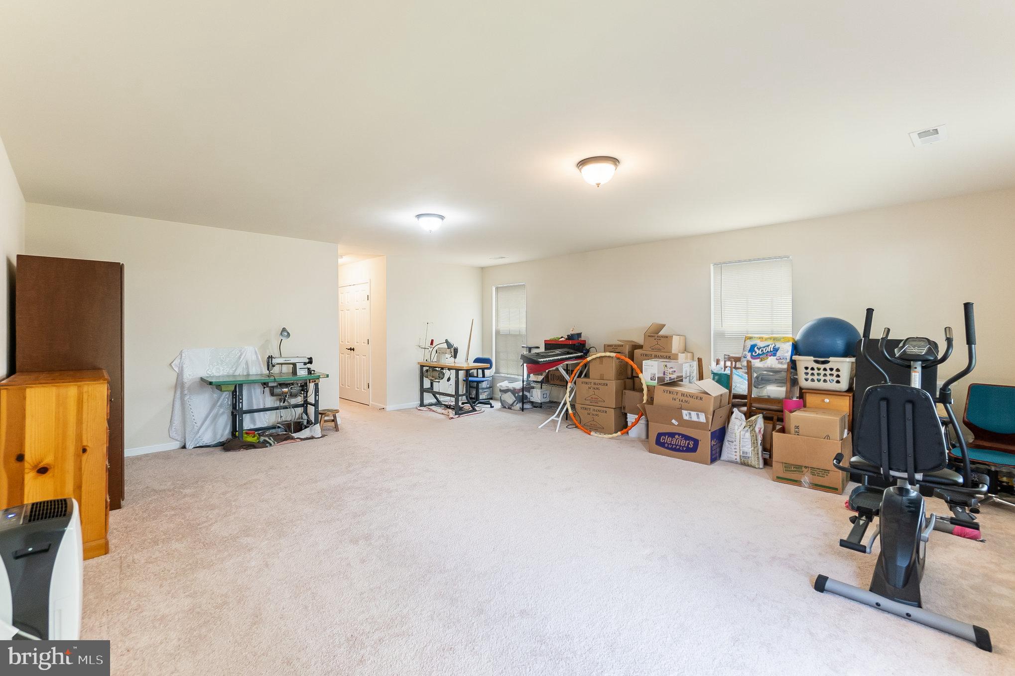 4711 Wensel Road Fredericksburg, VA 22408 - Photo 27 of 33 a view of a room with gym equipment