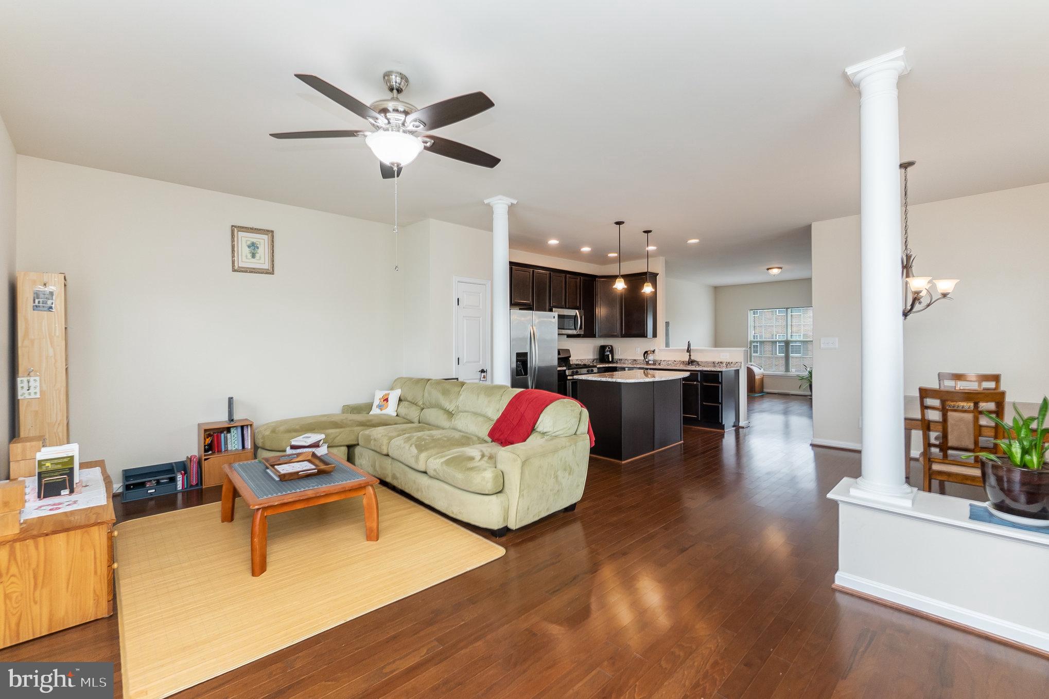 4711 Wensel Road Fredericksburg, VA 22408 - Photo 6 of 33 a living room with furniture and kitchen view