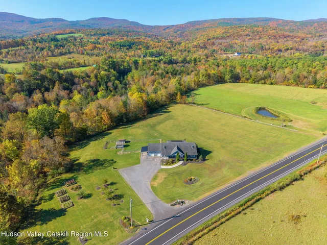 a view of a pool with a yard
