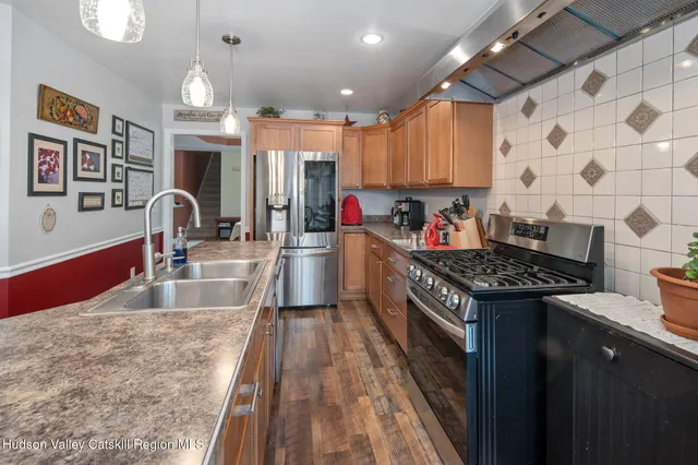 a bathroom with a bathtub sink and toilet