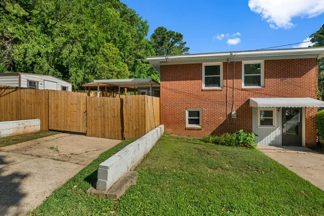 a view of a backyard with plants
