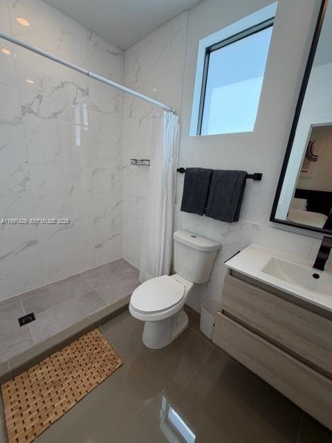 3645 Southwest 3rd Street Miami, FL 33135 - Photo 15 of 23 a bathroom with a toilet and a shower