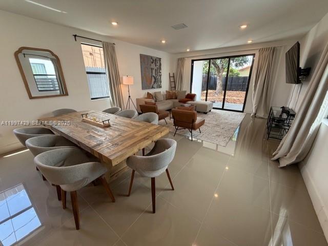 3645 Southwest 3rd Street Miami, FL 33135 - Photo 2 of 23 a living room with furniture and a flat screen tv