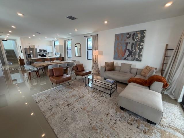 3645 Southwest 3rd Street Miami, FL 33135 - Photo 4 of 23 a living room with furniture and a table