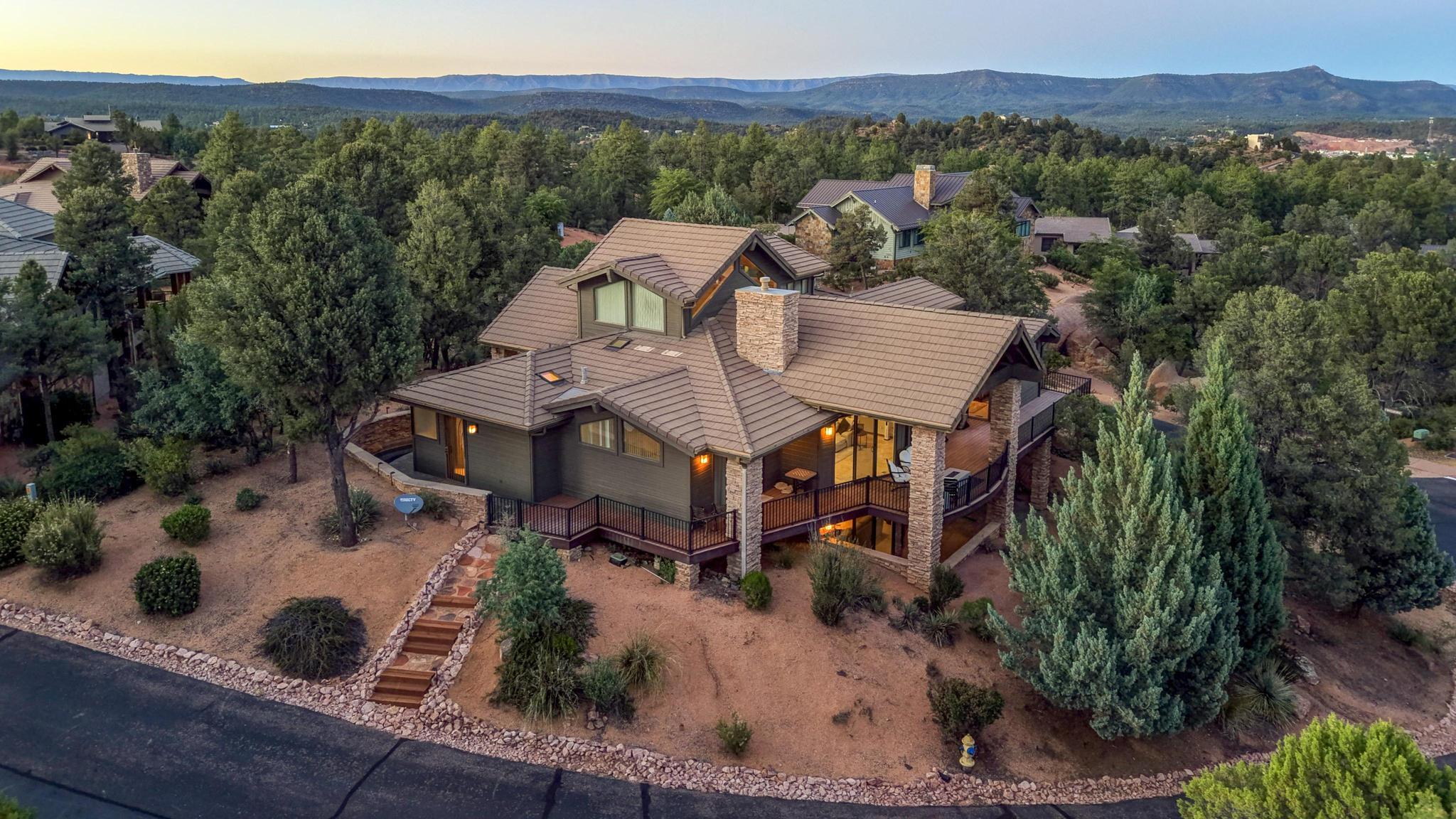2908 East Rim Club Drive Payson, AZ 85541 - Photo 76 of 77 an aerial view of a house with a garden