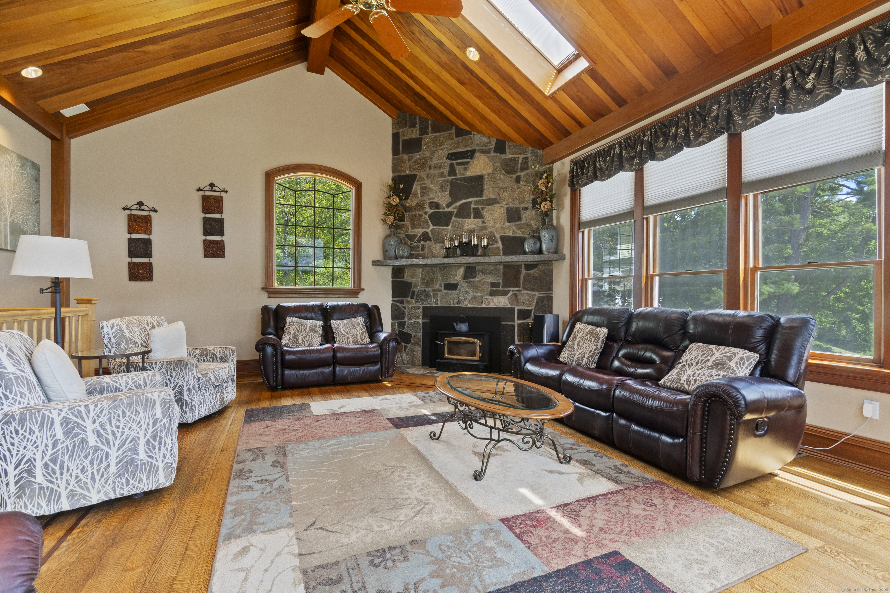 291 Injun Hollow Road Haddam, CT 06424 - Photo 12 of 30 a living room with furniture and a fireplace