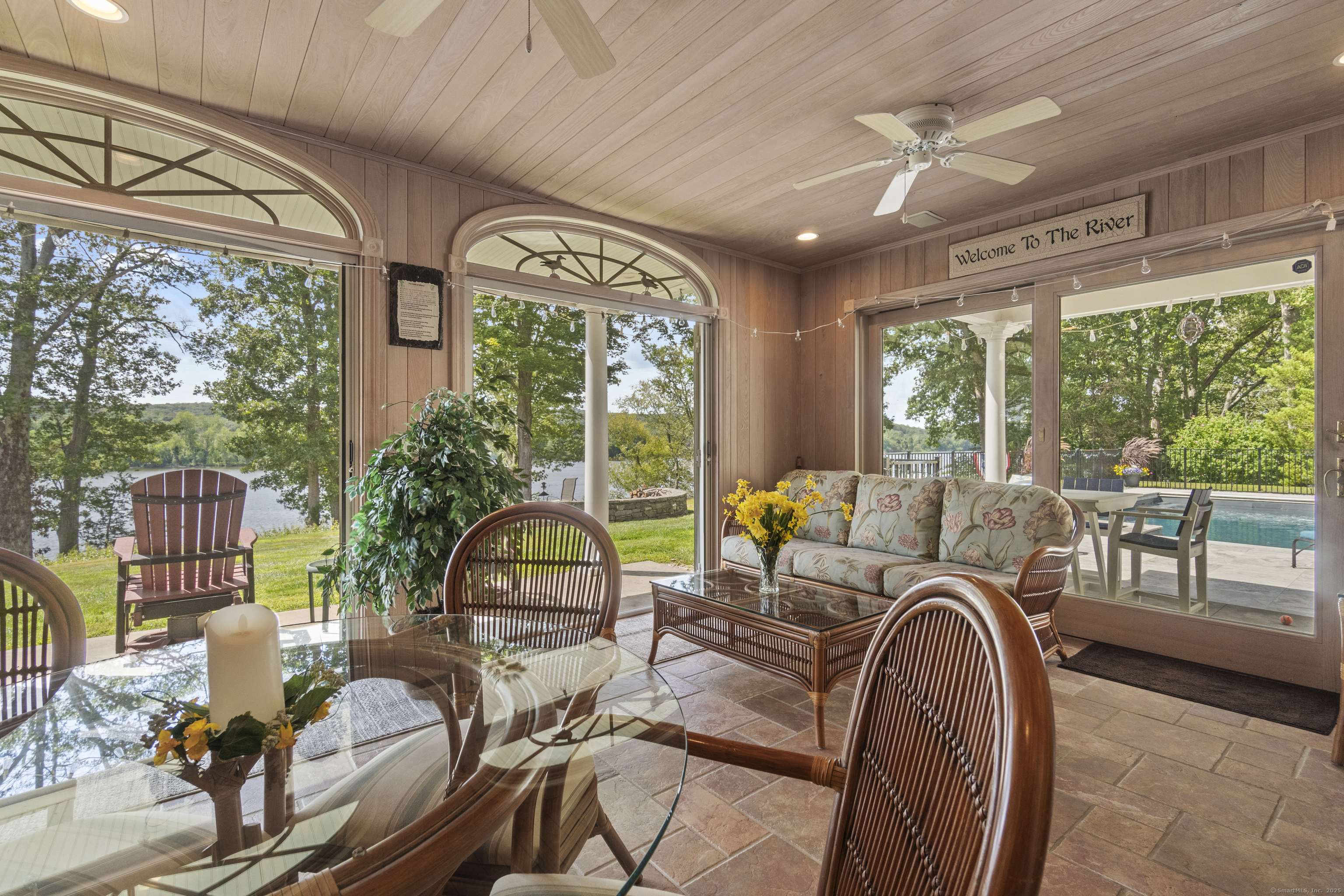 291 Injun Hollow Road Haddam, CT 06424 - Photo 16 of 30 a bedroom with furniture and large windows