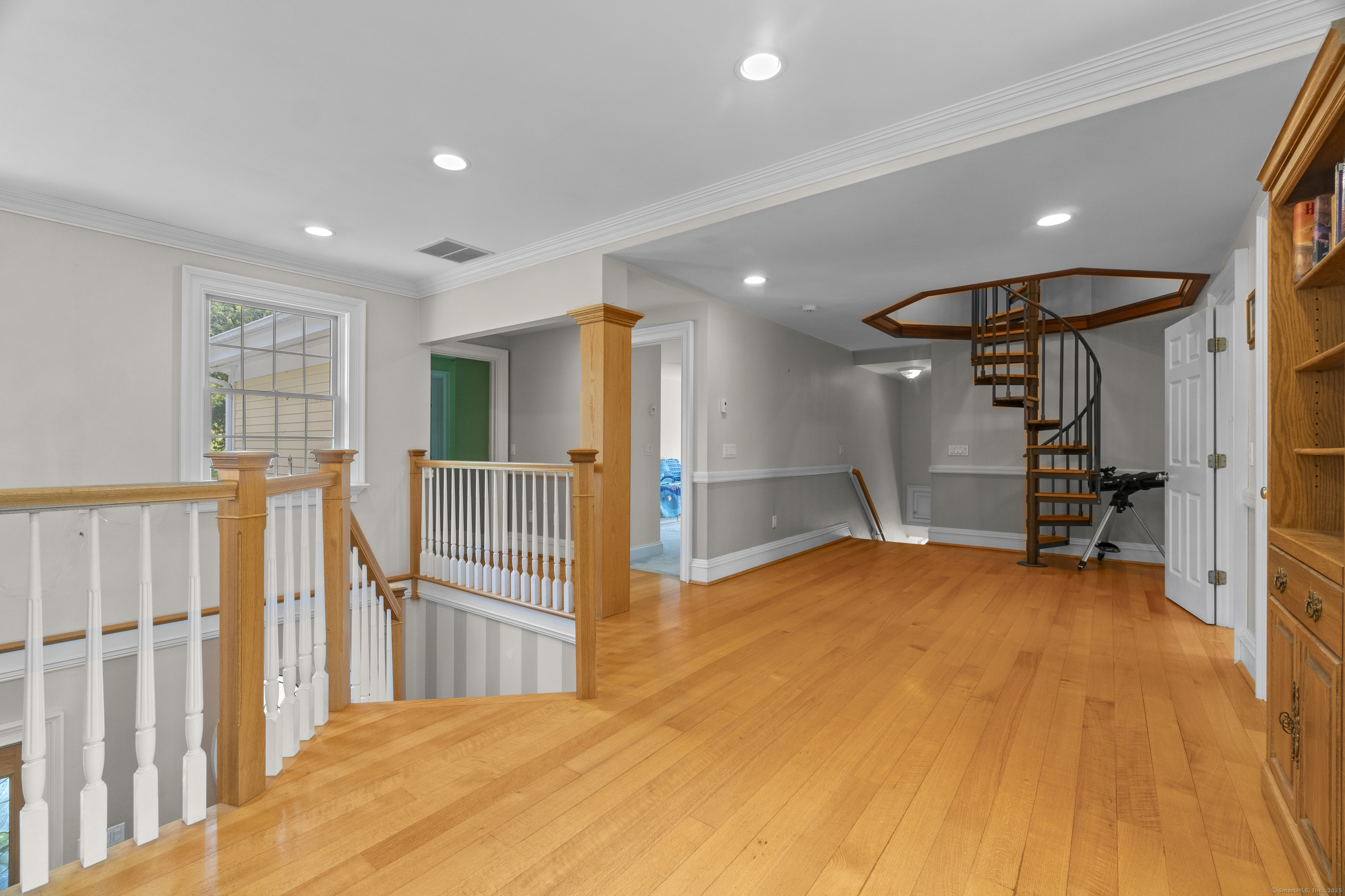 291 Injun Hollow Road Haddam, CT 06424 - Photo 20 of 30 a view of a livingroom with wooden floor and entryway