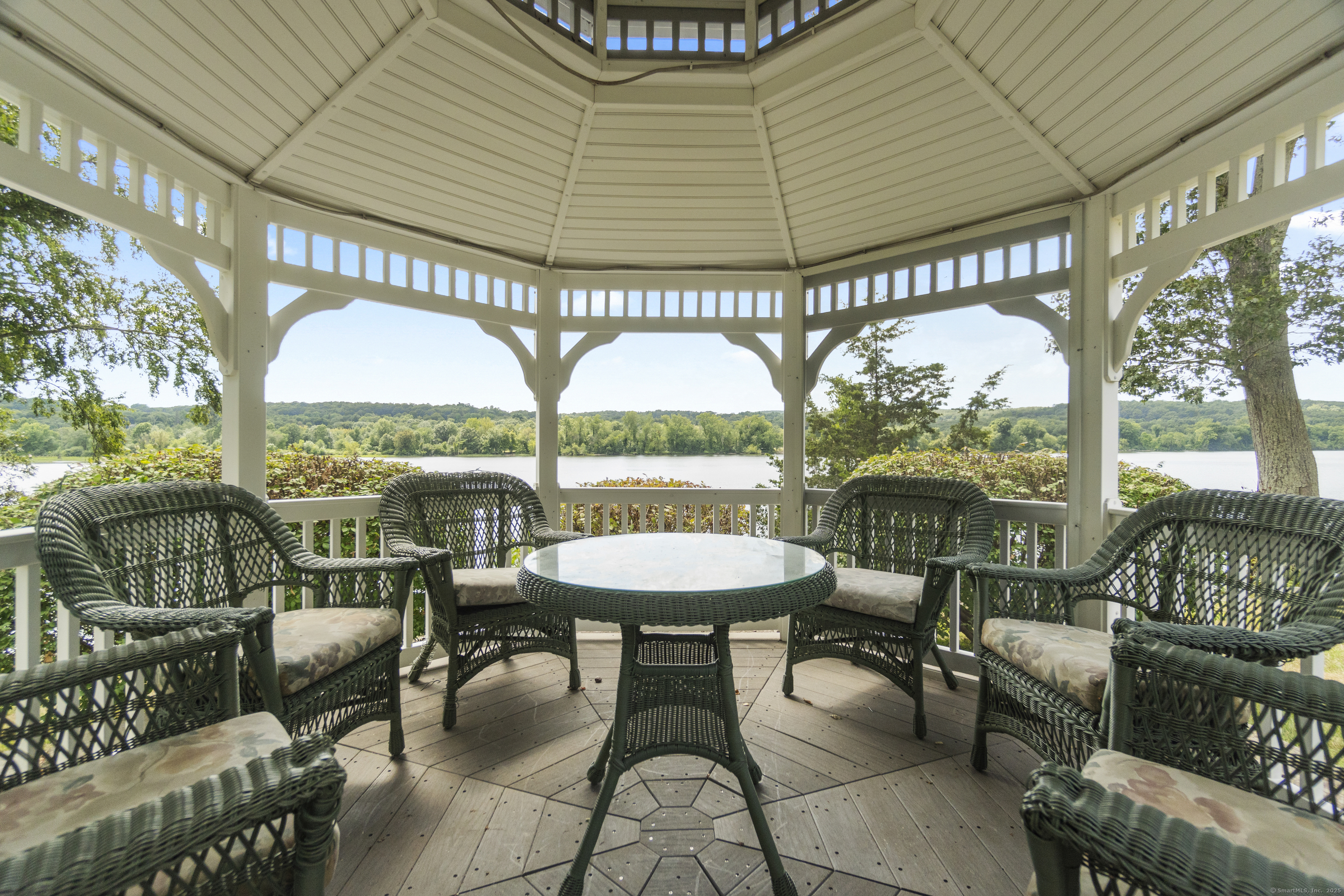 291 Injun Hollow Road Haddam, CT 06424 - Photo 25 of 30 a balcony with furniture and a large window