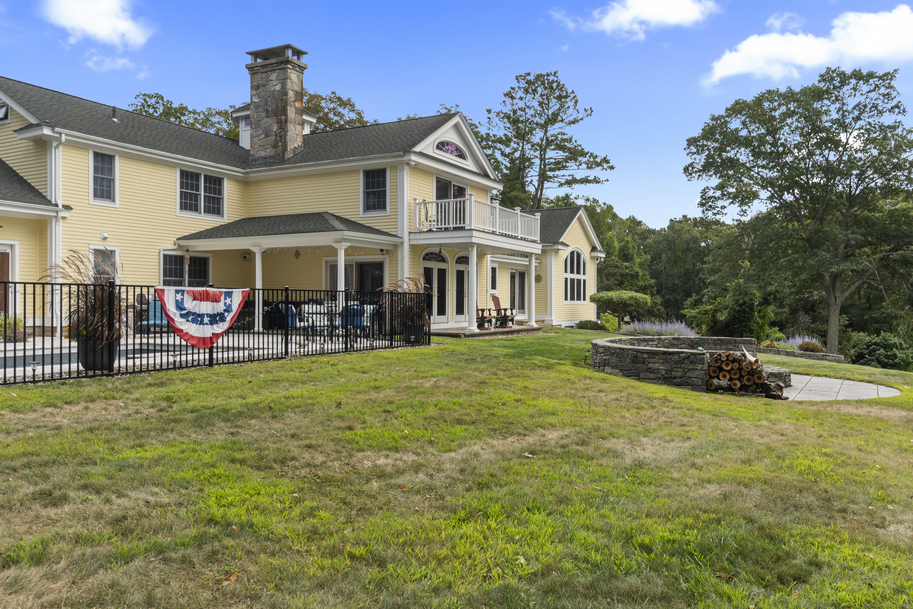 291 Injun Hollow Road Haddam, CT 06424 - Photo 5 of 30 a view of a house with a swimming pool