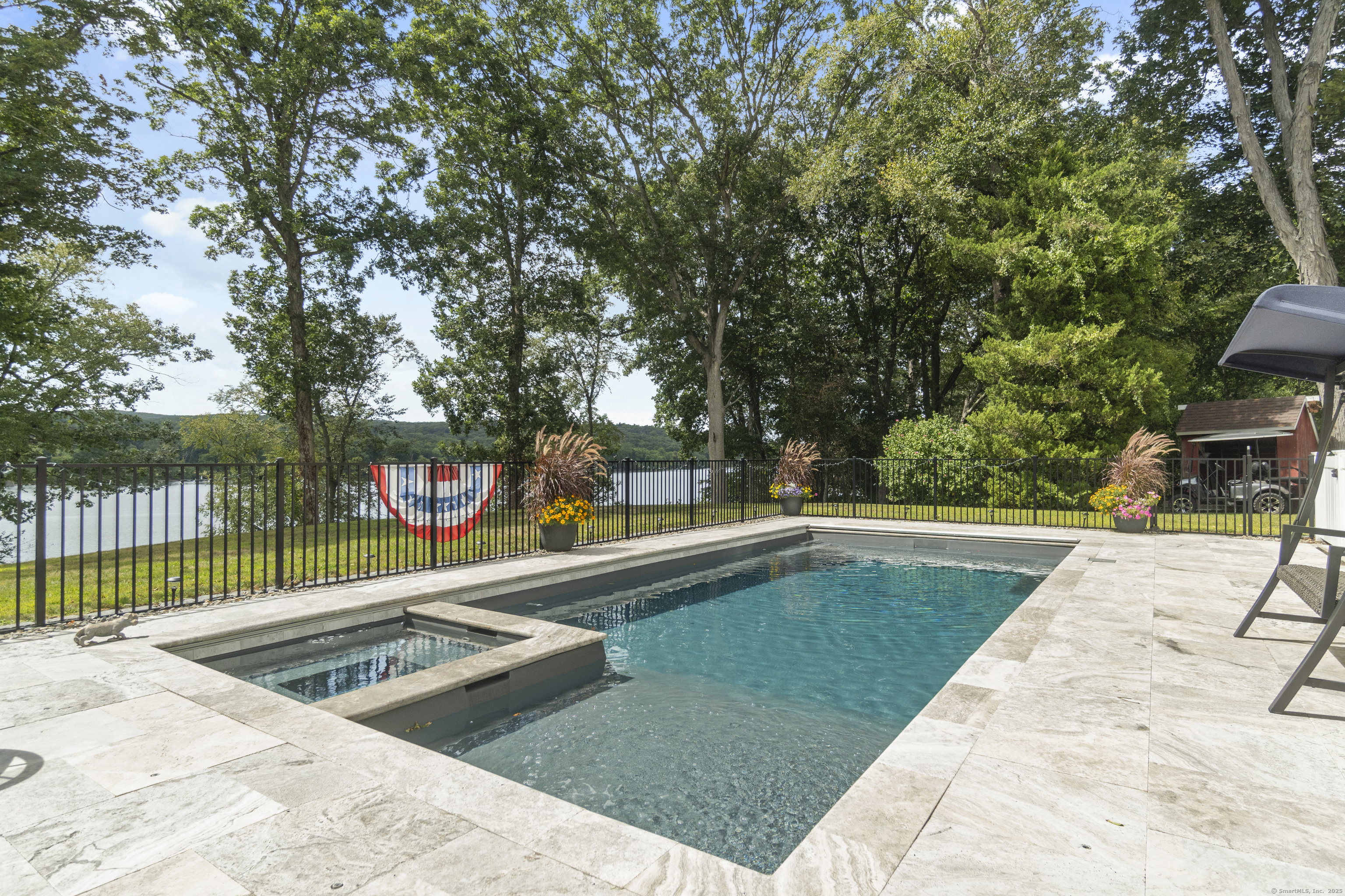 291 Injun Hollow Road Haddam, CT 06424 - Photo 8 of 30 a view of swimming pool with a patio and a yard