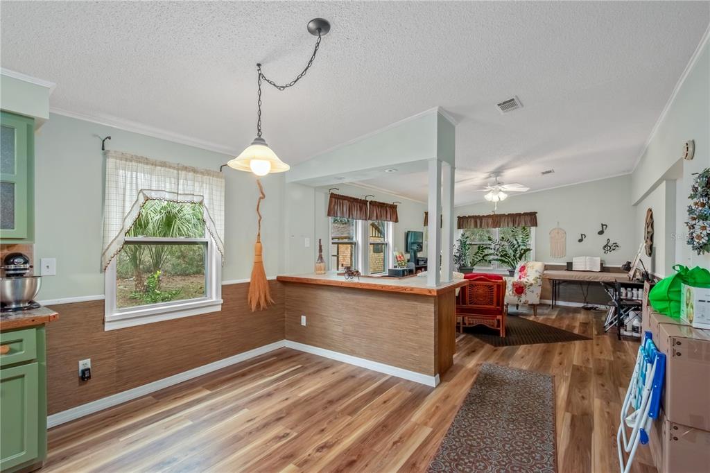 112 Magnolia Street Hawthorne, FL 32640 - Photo 14 of 41 a view of a dining room with furniture window and outside view