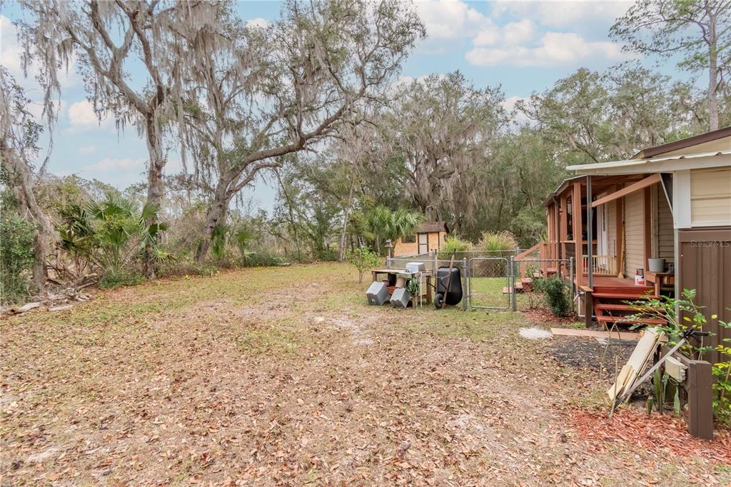 112 Magnolia Street Hawthorne, FL 32640 - Photo 35 of 41 a view of a house with a patio
