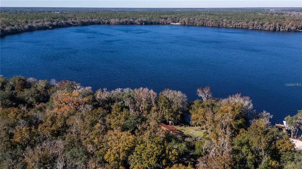 112 Magnolia Street Hawthorne, FL 32640 - Photo 41 of 41 a view of a lake with a forest