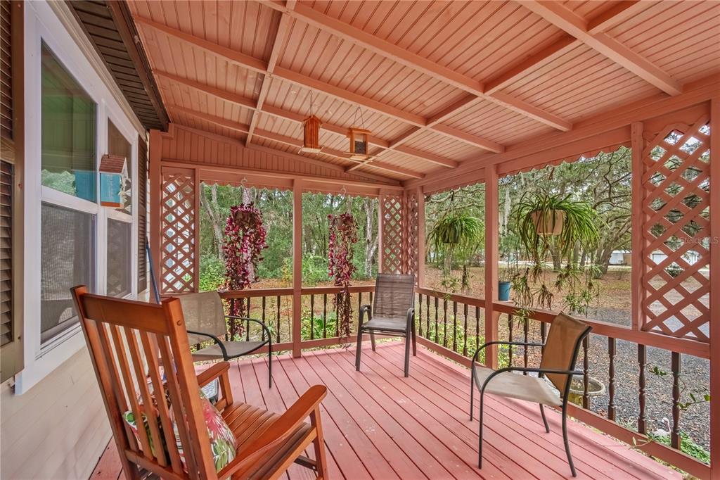 112 Magnolia Street Hawthorne, FL 32640 - Photo 6 of 41 a view of a two chairs in the balcony