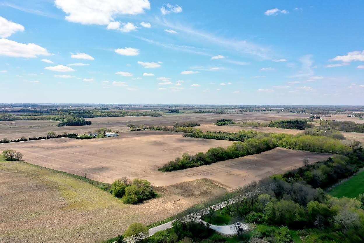 0 Rt 113 Bonfield, IL 60913 - Photo 3 of 9 a view of a lake with beach and city view