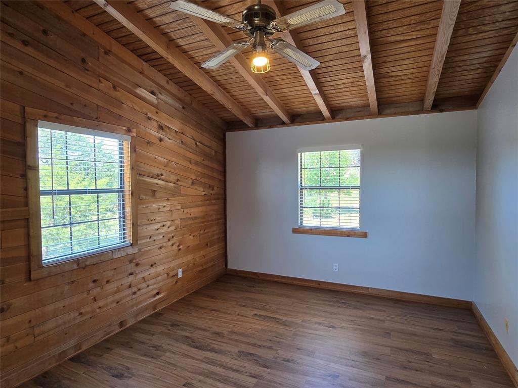 3505 Farmer Road Azle, TX 76020 - Photo 29 of 40 Spacious upstairs bedroom has a view to the side and back yards.
