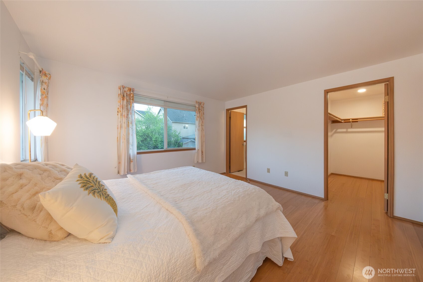 830 234th Street Southeast Bothell, WA 98021 - Photo 10 of 26 a bedroom with a bed and a window