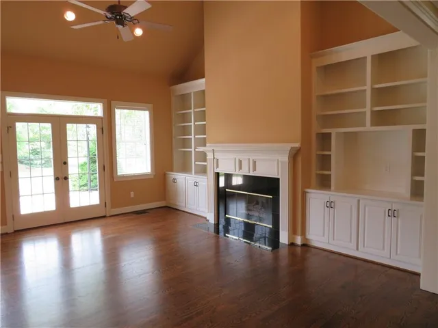 a view of entryway with wooden floor