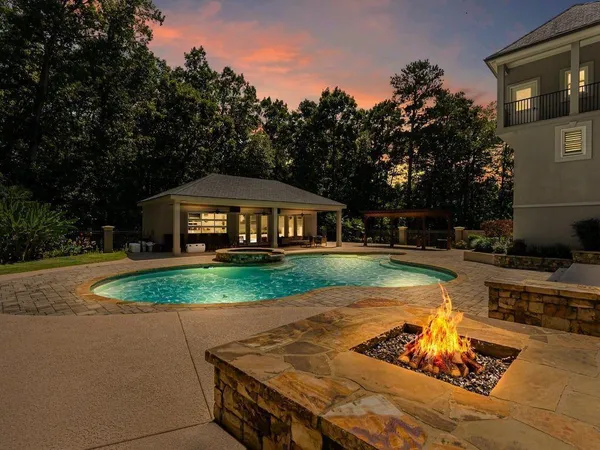 an aerial view of a house with outdoor space