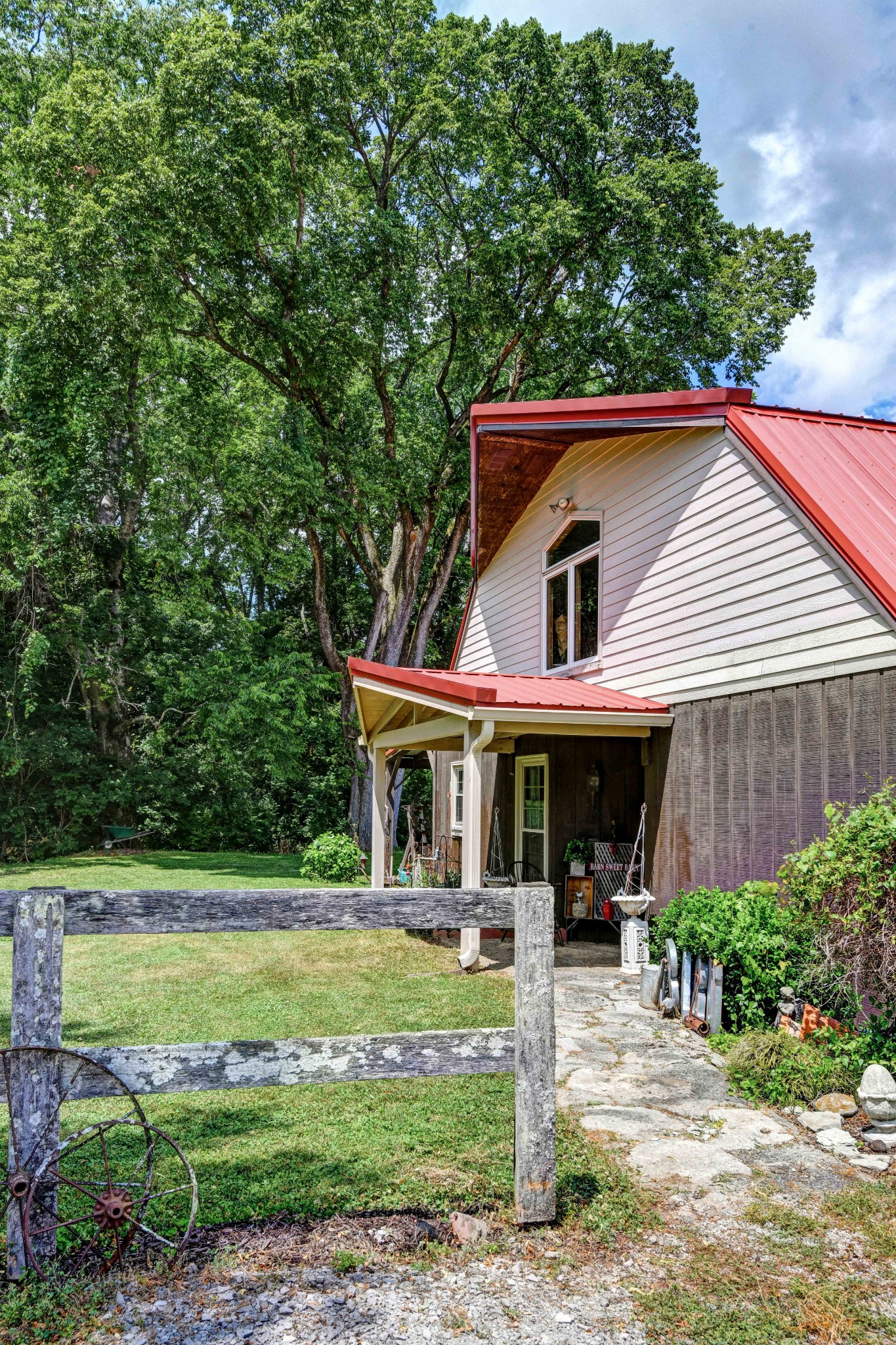 3309 Blazer Road Franklin, TN 37064 - Photo 5 of 37 a view of a house with a yard plants and large tree