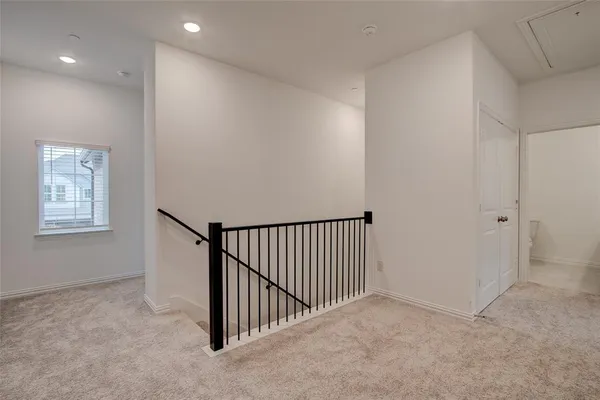 a view of a hallway with entryway