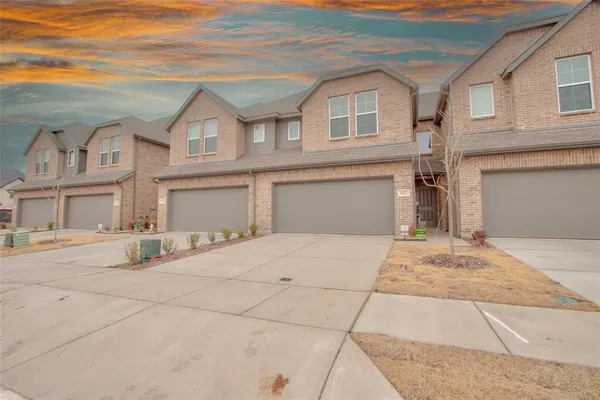 front view of a house with a garage