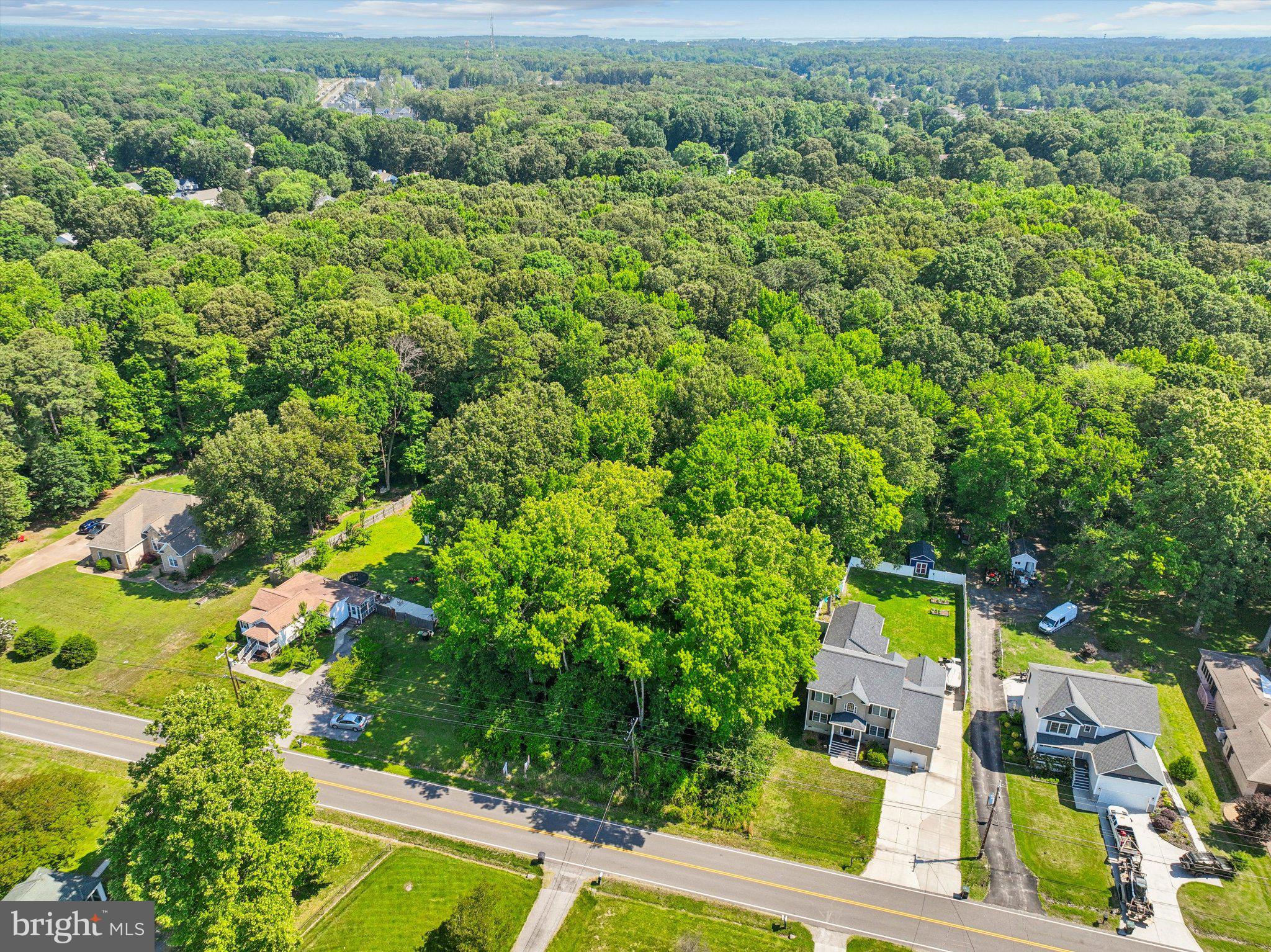 500-508 Carys Chapel Road Yorktown, VA 23693 - Photo 17 of 18 an aerial view of residential houses with outdoor space and trees