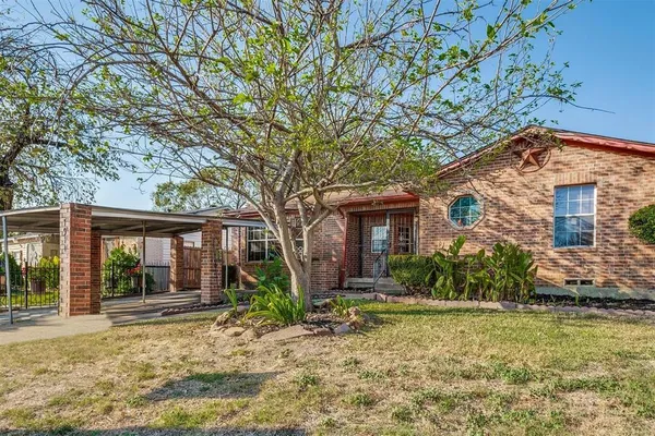 front view of house with a yard