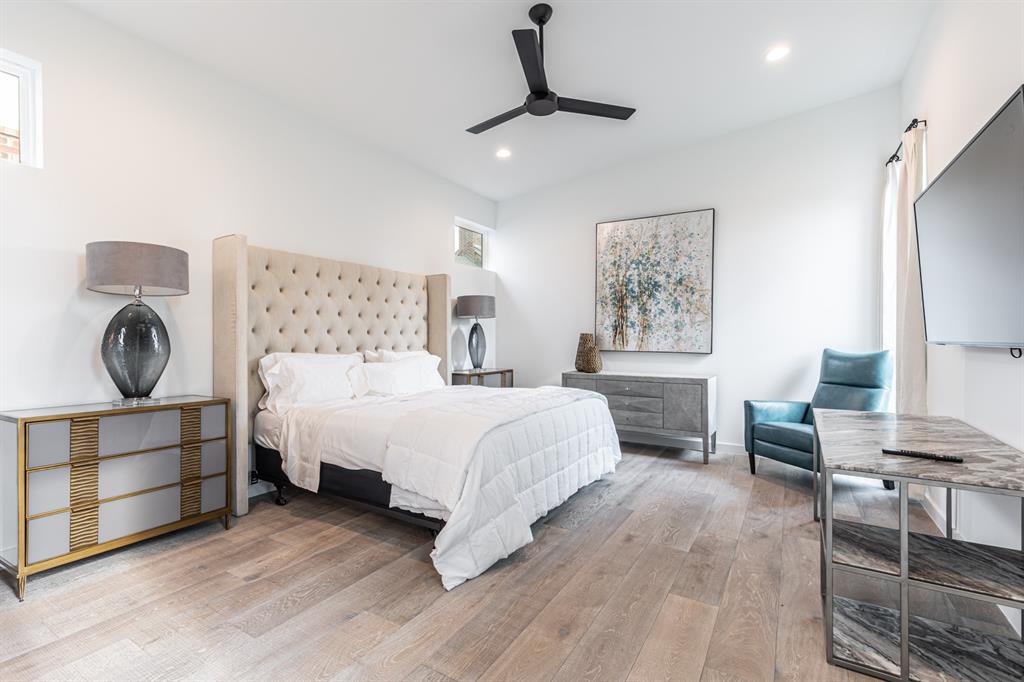 4202 Bonham Street Dallas, TX 75229 - Photo 12 of 32 Bedroom featuring light wood-style floors, recessed lighting, and a ceiling fan