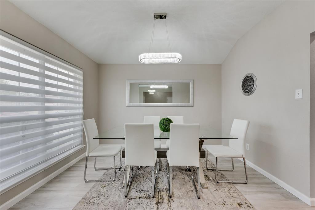 506 Pecos Path Drive Murphy, TX 75094 - Photo 11 of 19 a view of a dining room with furniture and a window