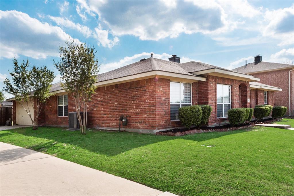 506 Pecos Path Drive Murphy, TX 75094 - Photo 2 of 19 a front view of a house with a yard