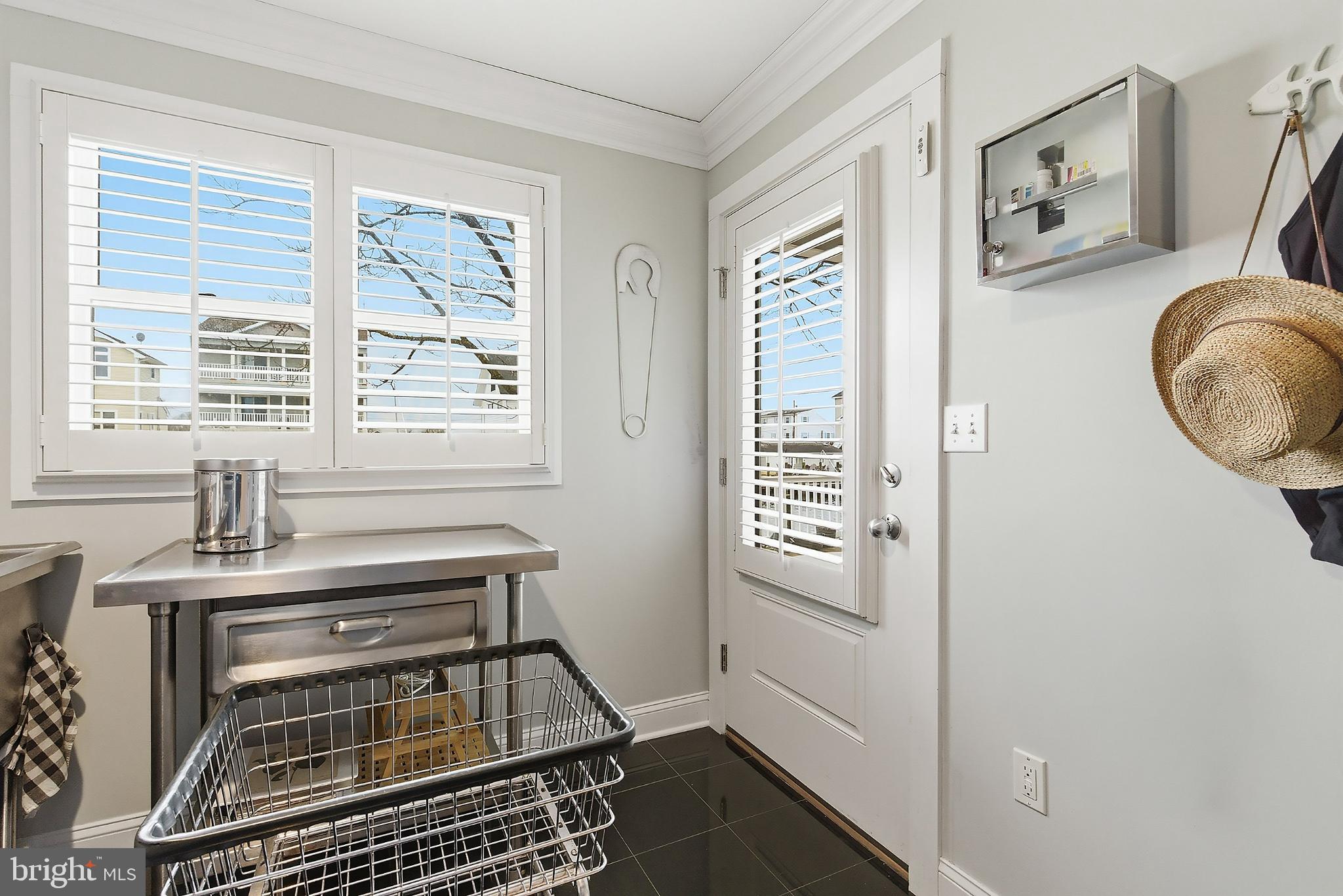 33 Sands Point Road Waretown, NJ 08758 - Photo 17 of 79 a kitchen with granite countertop a sink and a window