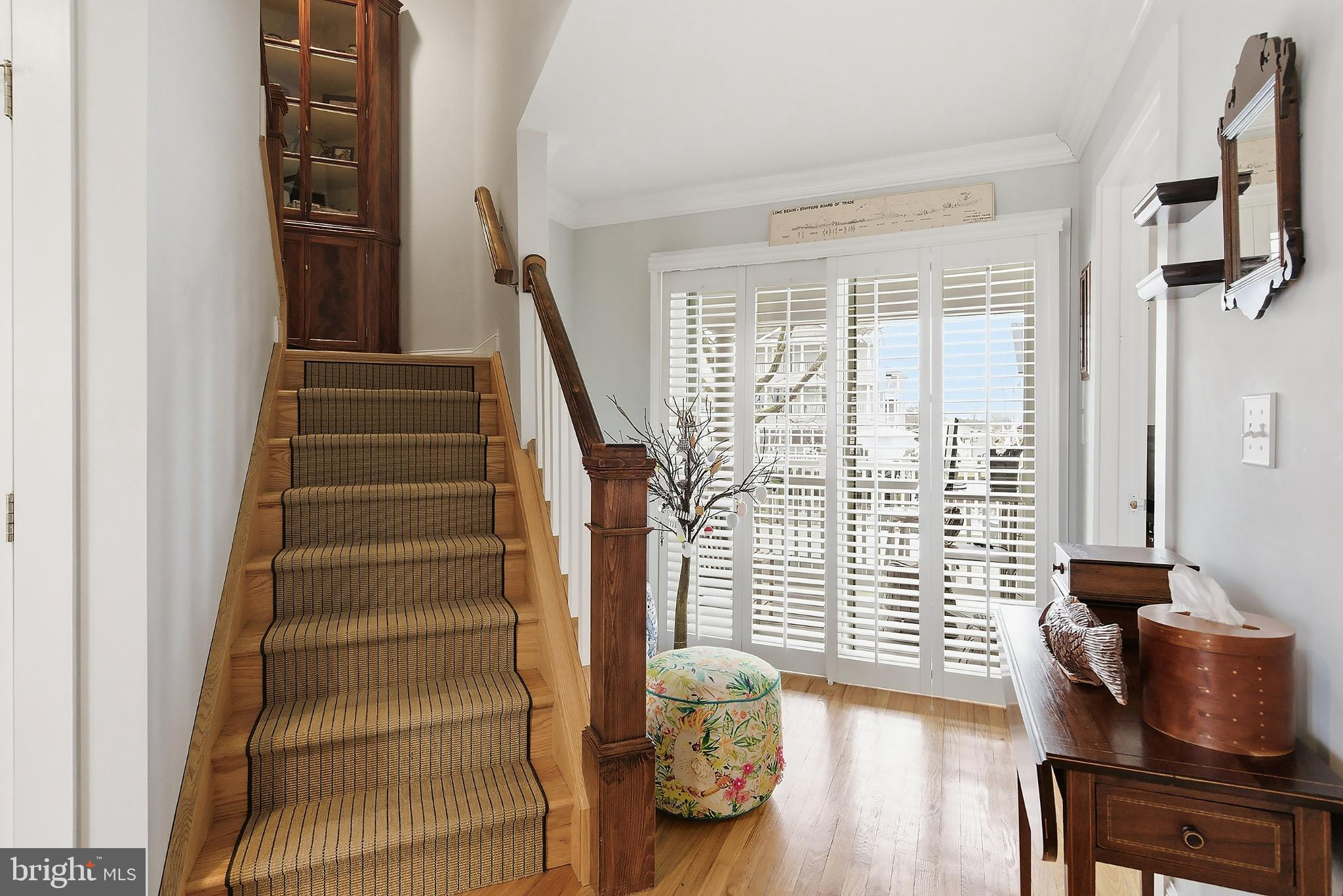 33 Sands Point Road Waretown, NJ 08758 - Photo 18 of 79 a view of entryway with wooden floor