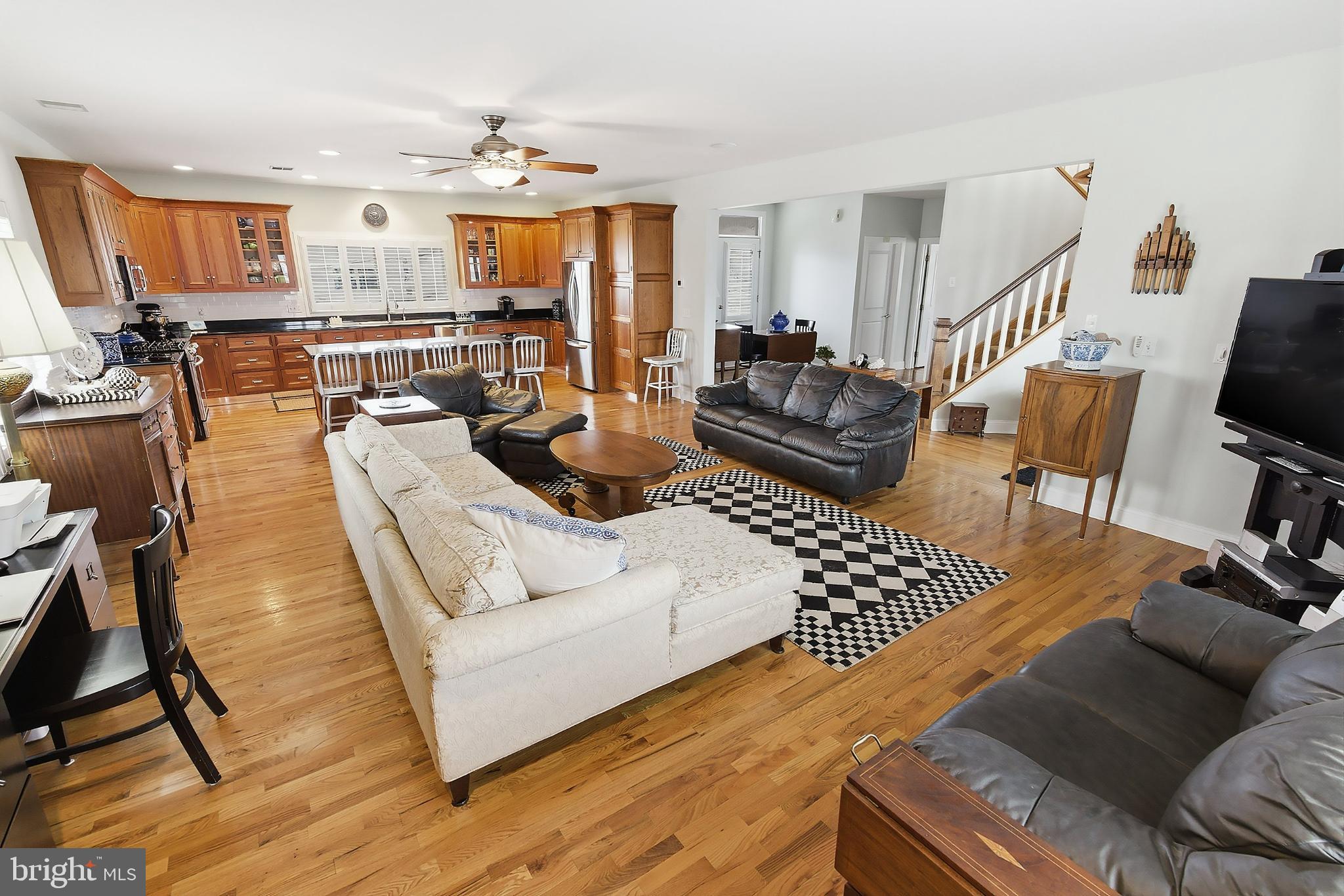 33 Sands Point Road Waretown, NJ 08758 - Photo 29 of 79 a living room with furniture a flat screen tv and kitchen view