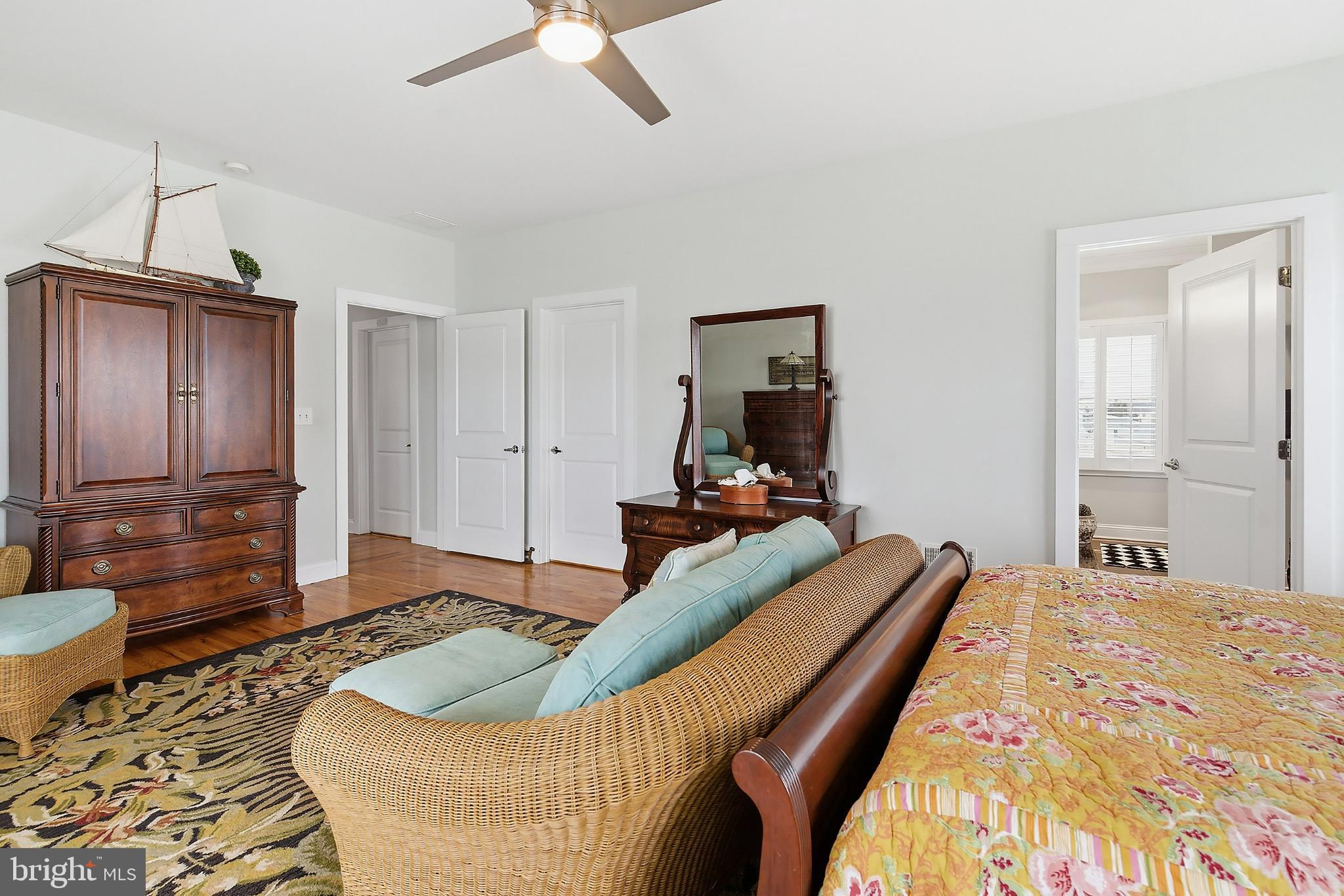 33 Sands Point Road Waretown, NJ 08758 - Photo 38 of 79 a bedroom with a bed and wooden floor