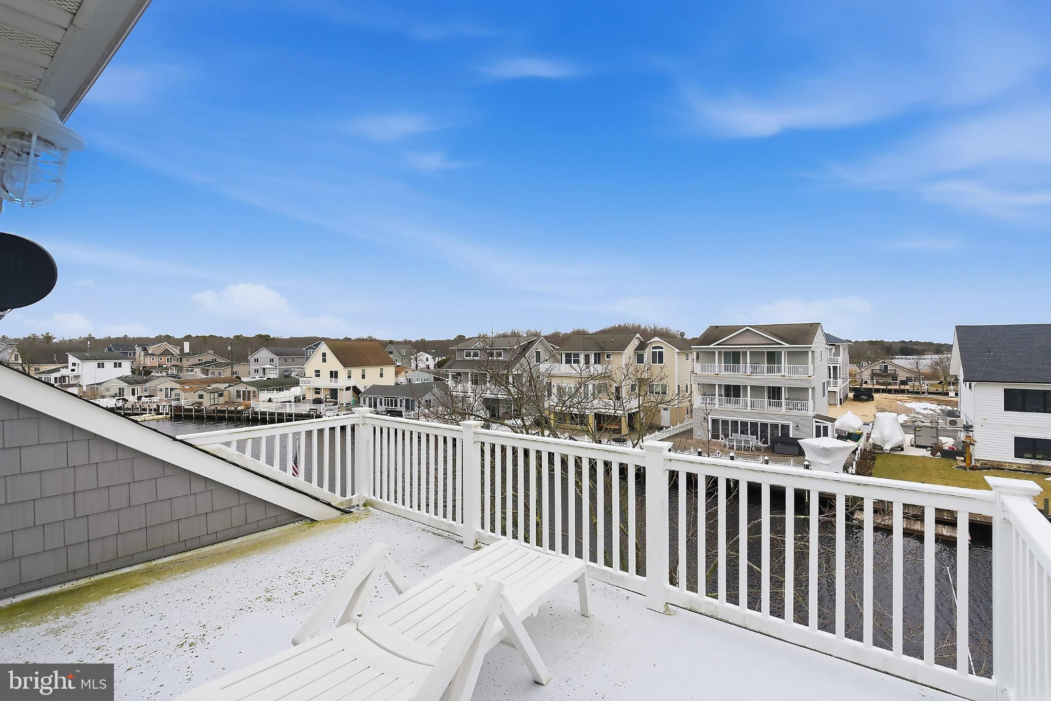 33 Sands Point Road Waretown, NJ 08758 - Photo 52 of 79 a view of a building from a balcony