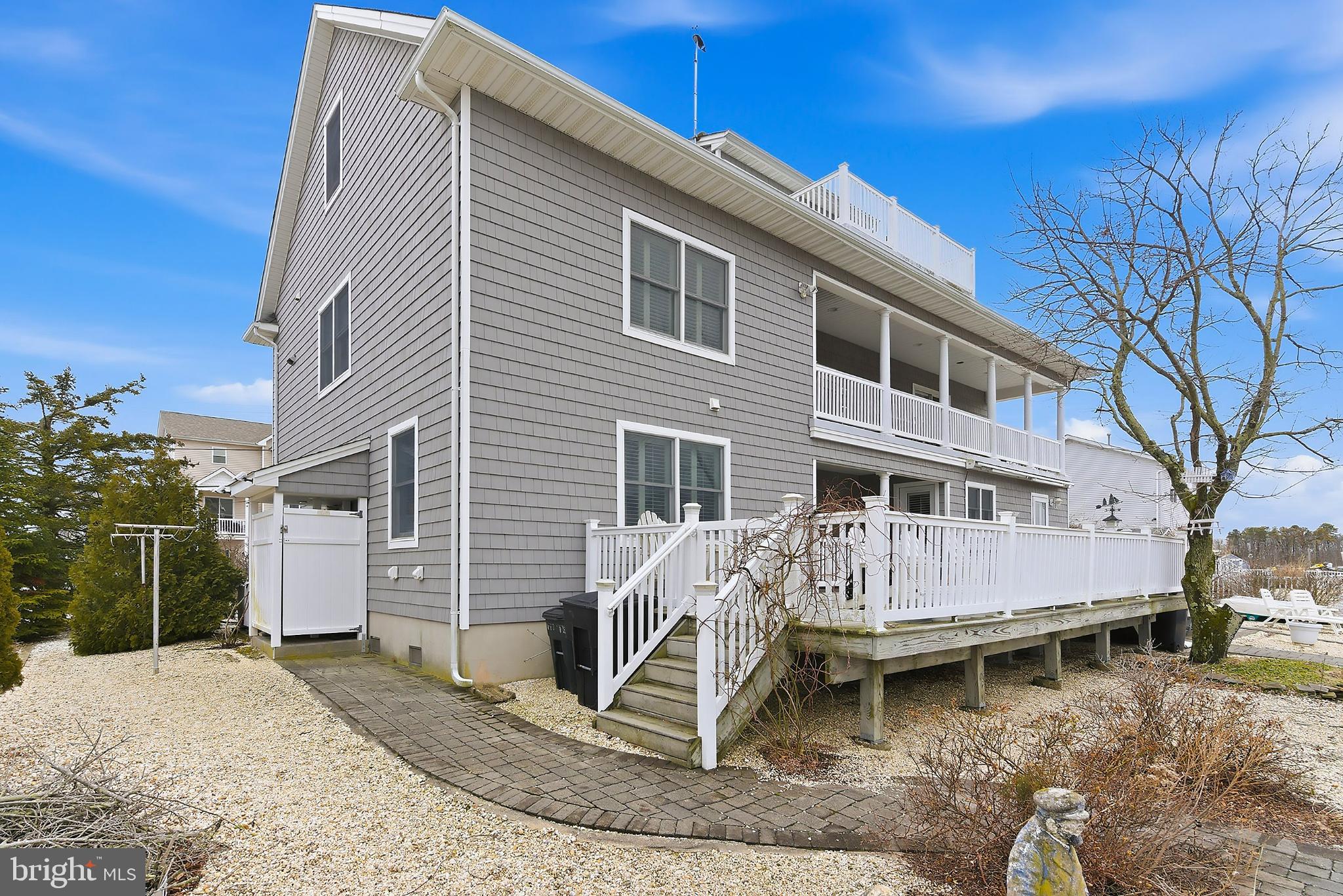 33 Sands Point Road Waretown, NJ 08758 - Photo 68 of 79 a view of a house with a yard
