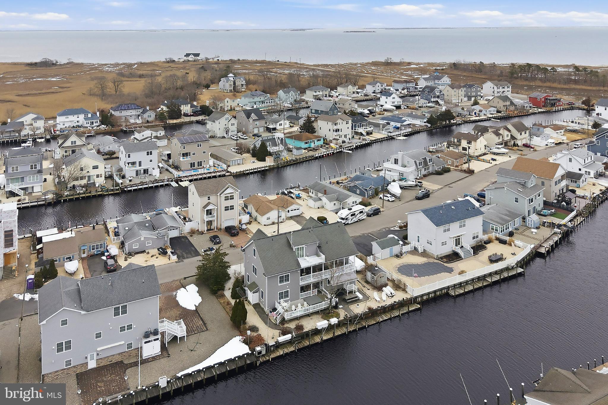 33 Sands Point Road Waretown, NJ 08758 - Photo 76 of 79 an aerial view of a city with ocean view